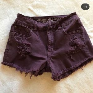 maroon ripped shorts